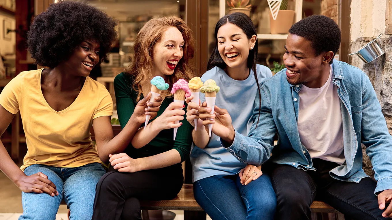 group of young adults enjoying ice cream