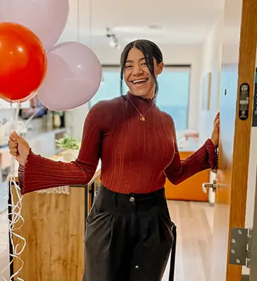 young woman with balloons