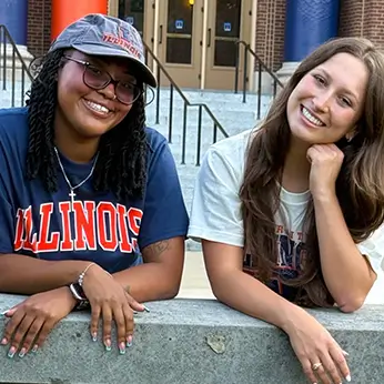 two young women smiling